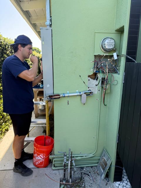 MCS Electric technician working on exterior electrical service