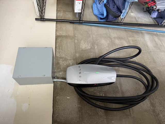 Tesla Wall Connector installation inside a garage