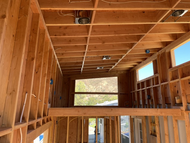 Electrical work in progress inside a framed residential addition