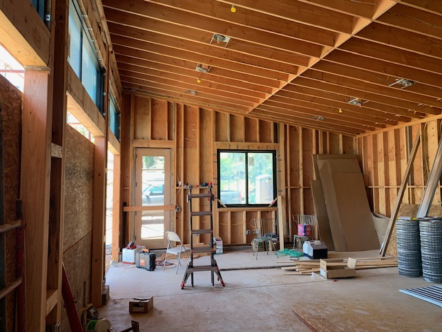 Interior framing and electrical work during a residential remodel