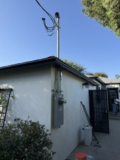 Exterior electrical service and weatherhead on an MCS Electric project