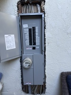 Main panel replacement with conduits above the enclosure