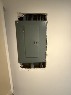 Recessed indoor subpanel during installation