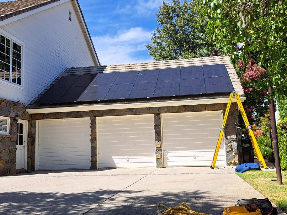 Solar panel installation above a residential garage